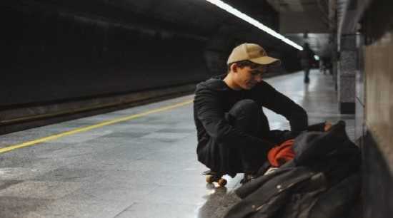 Stock image of a boy at a station
