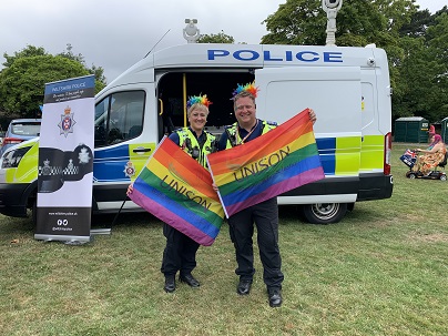 Lee and Kate with Pride flags