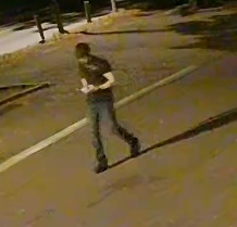 Man in all black walking