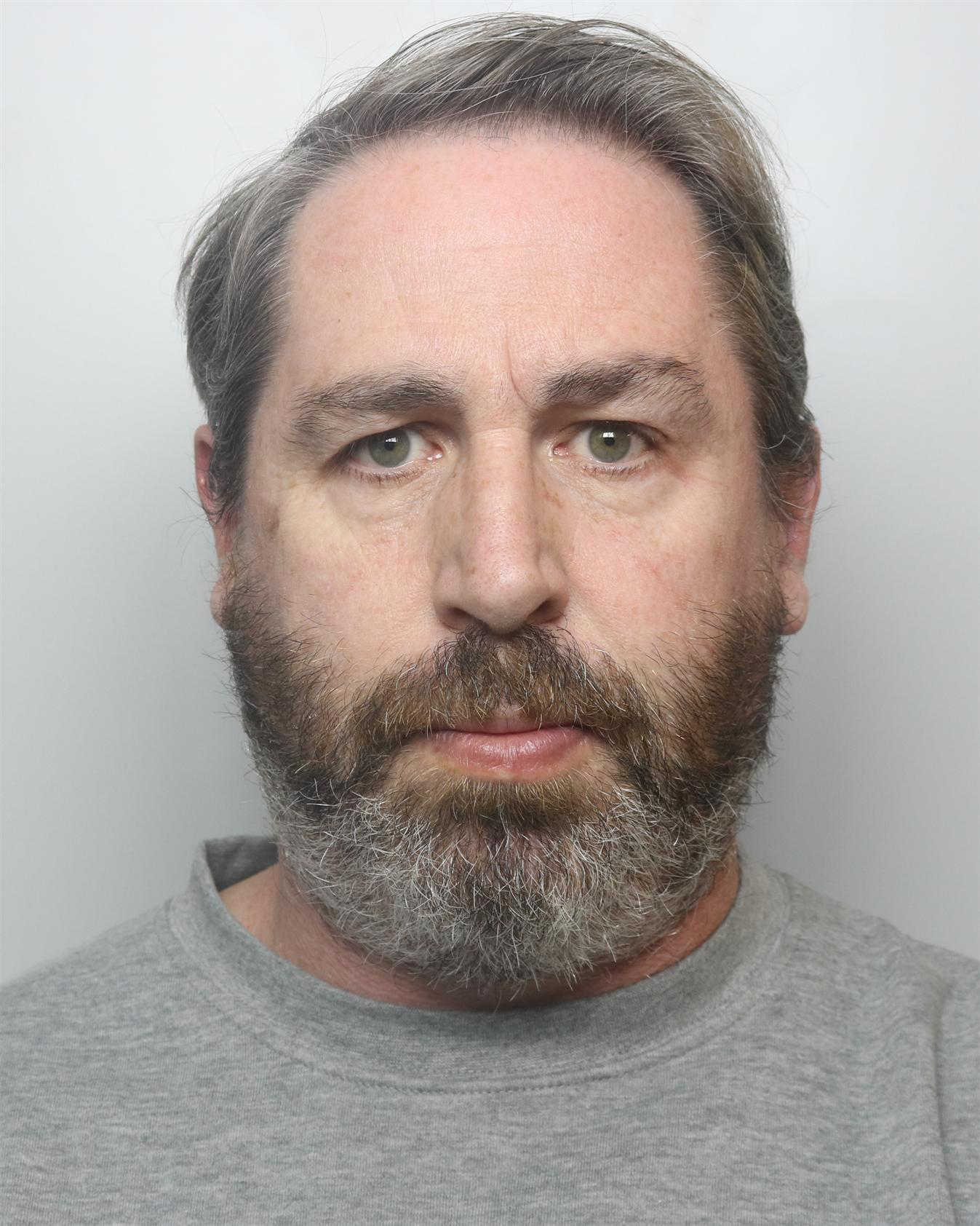 custody shot of John Devine