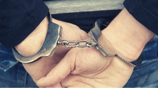 Hands in handcuffs