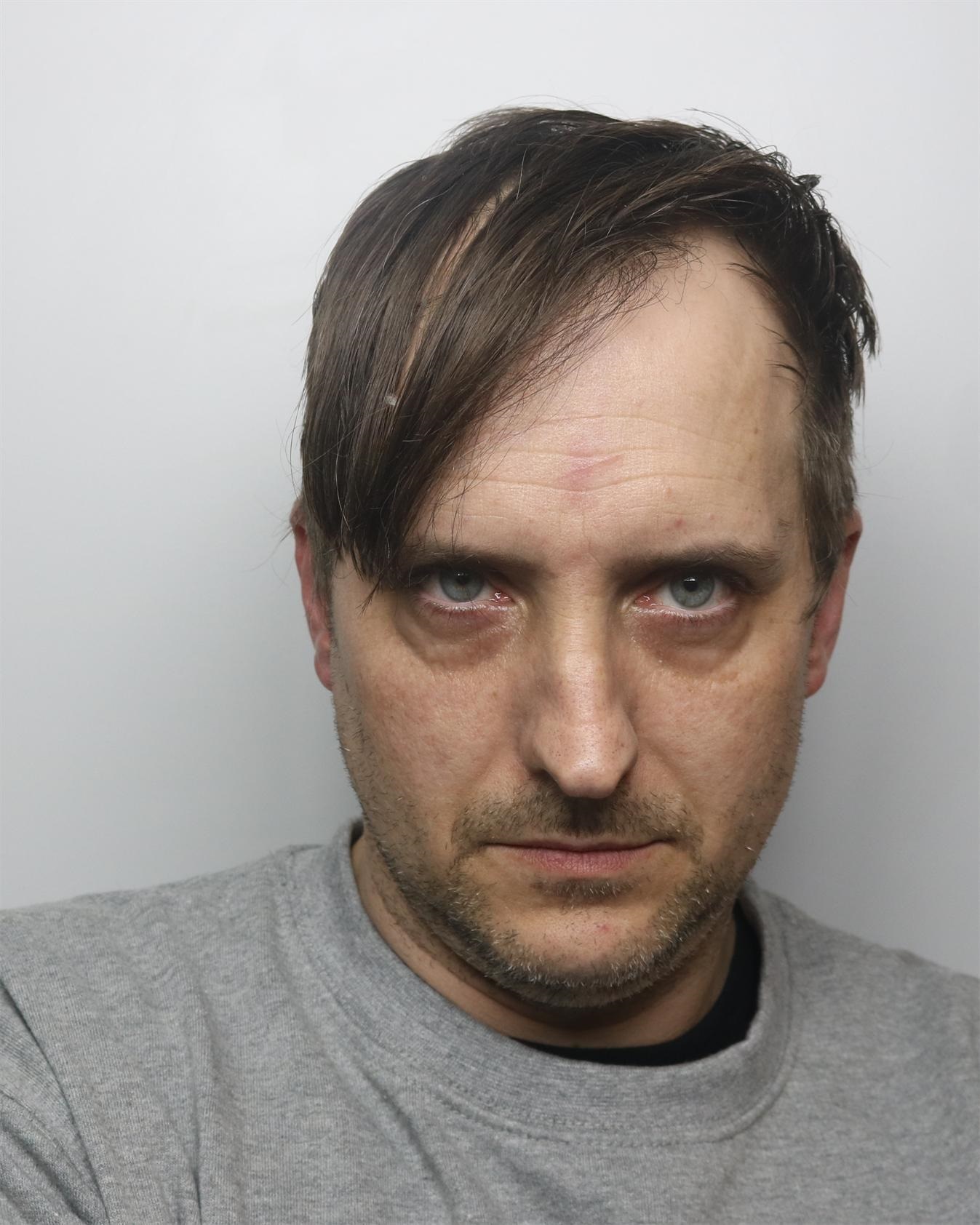 Custody shot of Philip Riley